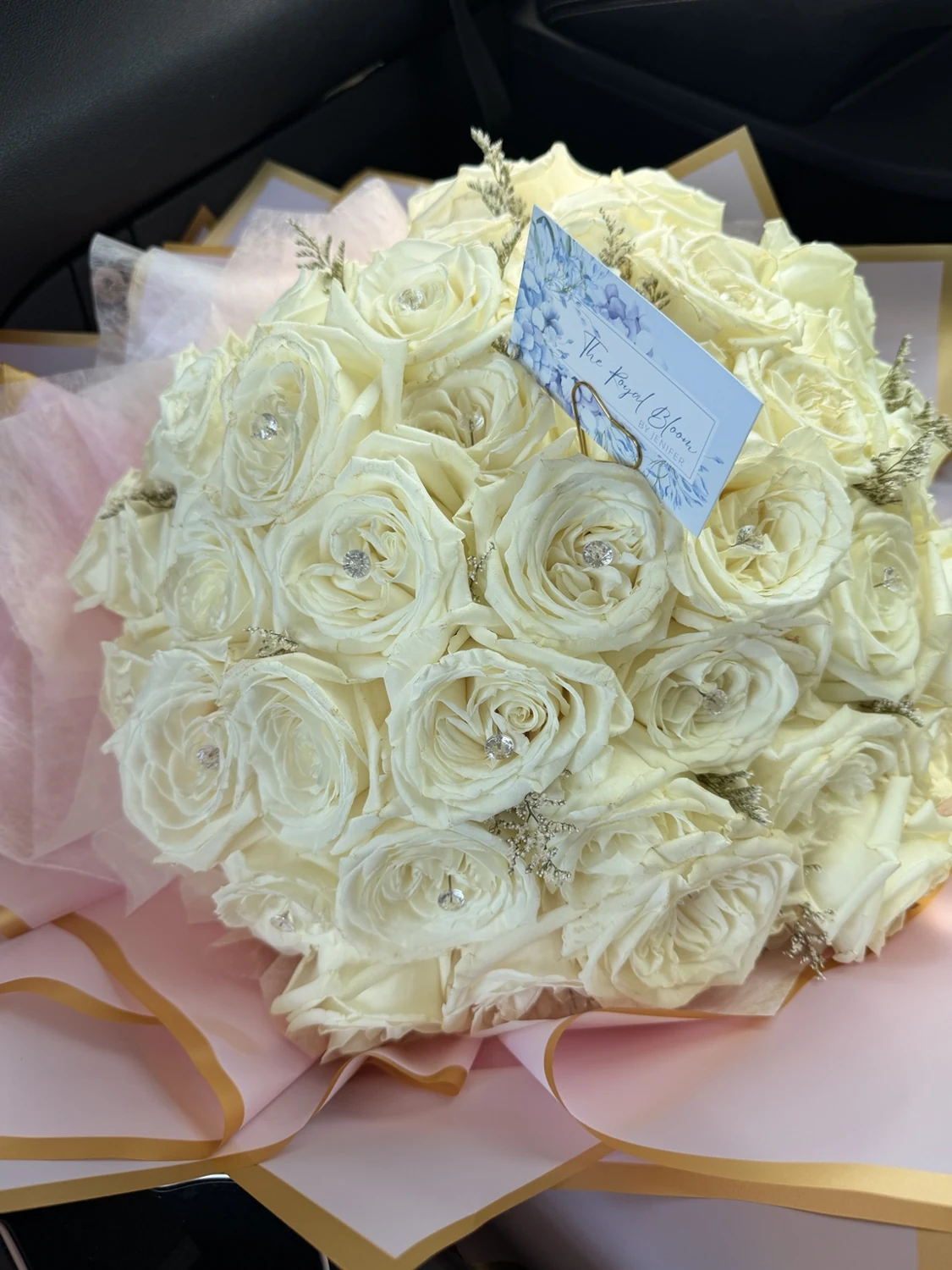 Rounded white rose bouquet